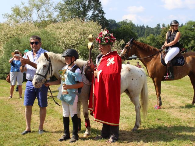 Un cavalier avec le roi à la fête de la Saint Martial à Saint-Léonard de Noblat